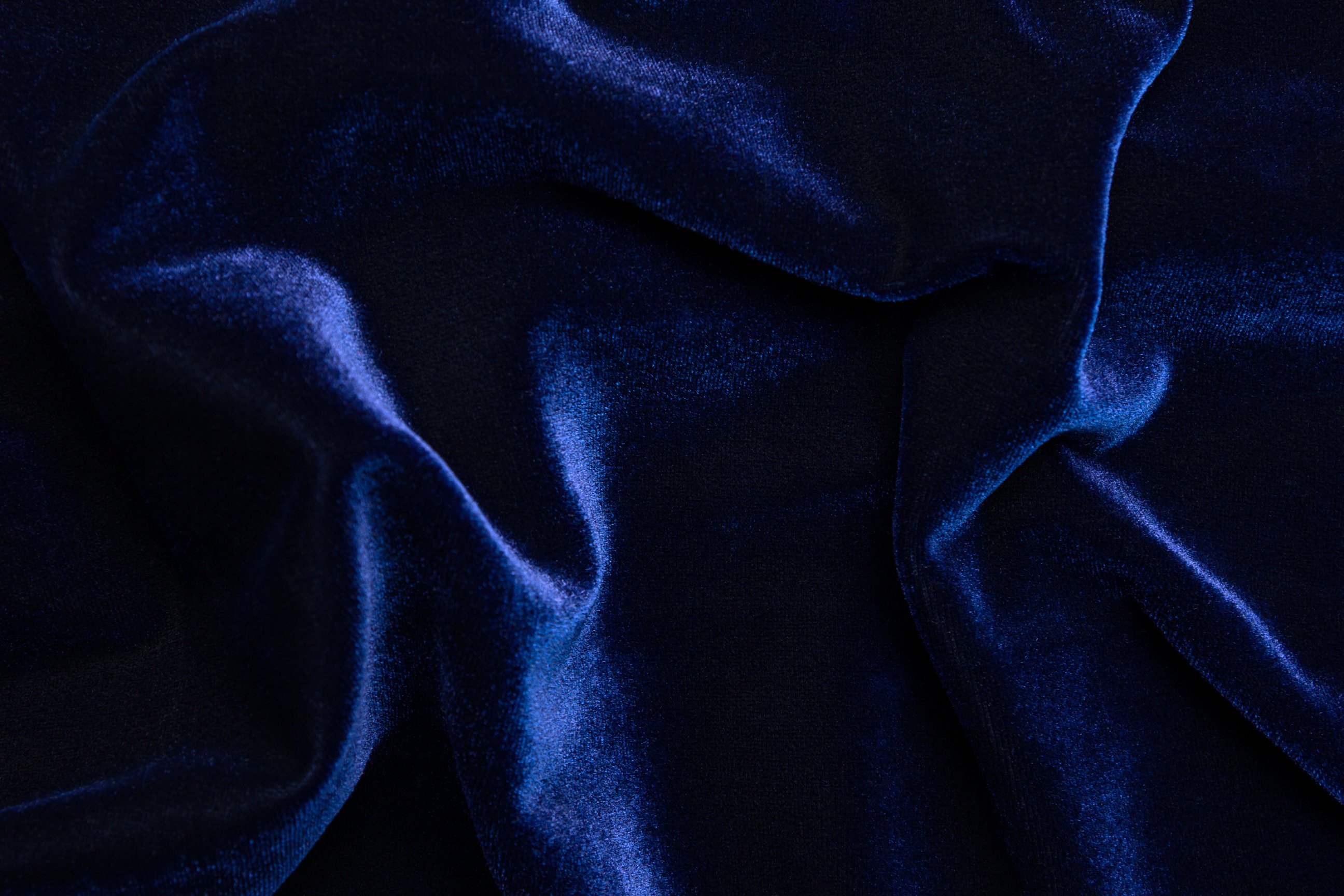 Beautiful luxury dark blue velvet texture background cloth.